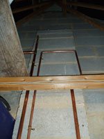 Another loop from the main feed to an outlet and a relief valve